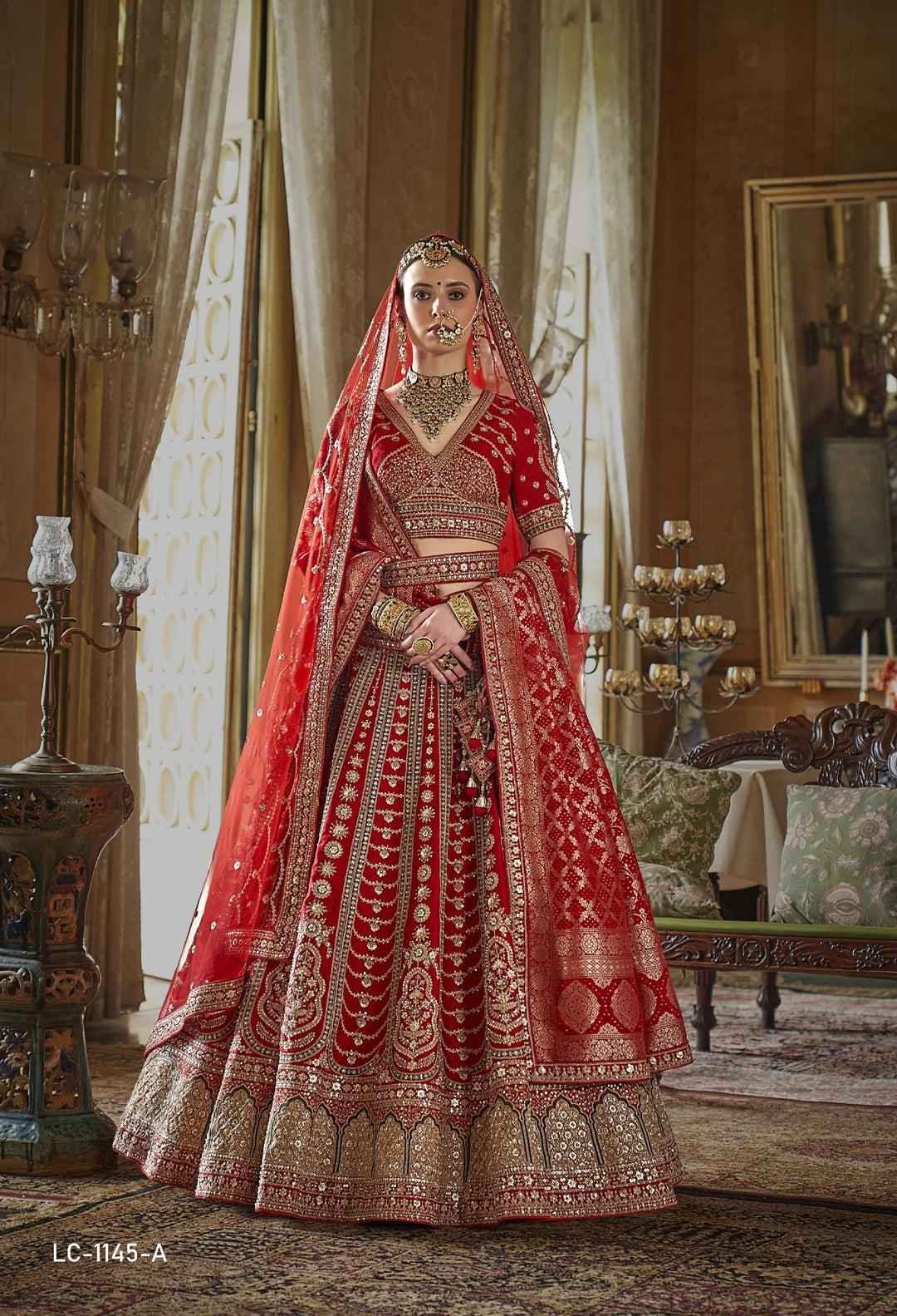 Bridal lehenga in classic red with rich gold embroidery, traditional motifs, and a regal bridal dupatta.
