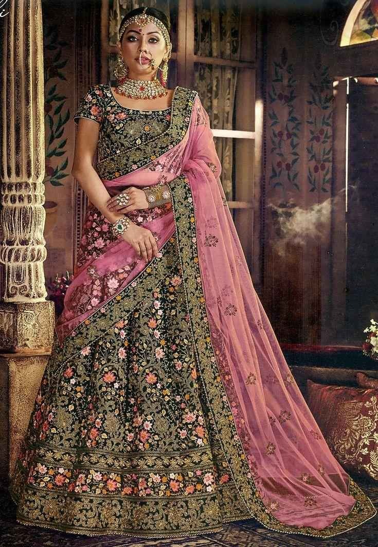 Best Bridal lehenga in black velvet with floral embroidery and contrasting pink dupatta for elegant winter weddings.