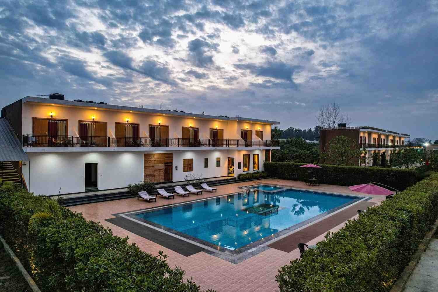 Premium spa resort entrance with covered driveway and luxury hospitality ambiance
