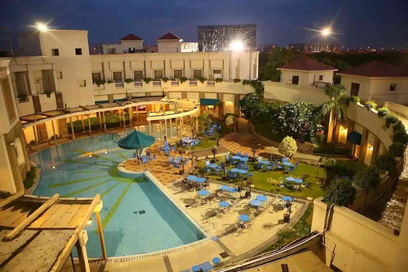The Stellar Gymkhana in Greater Noida featuring a luxury swimming pool, perfect for pool parties, weddings, and private celebrations.